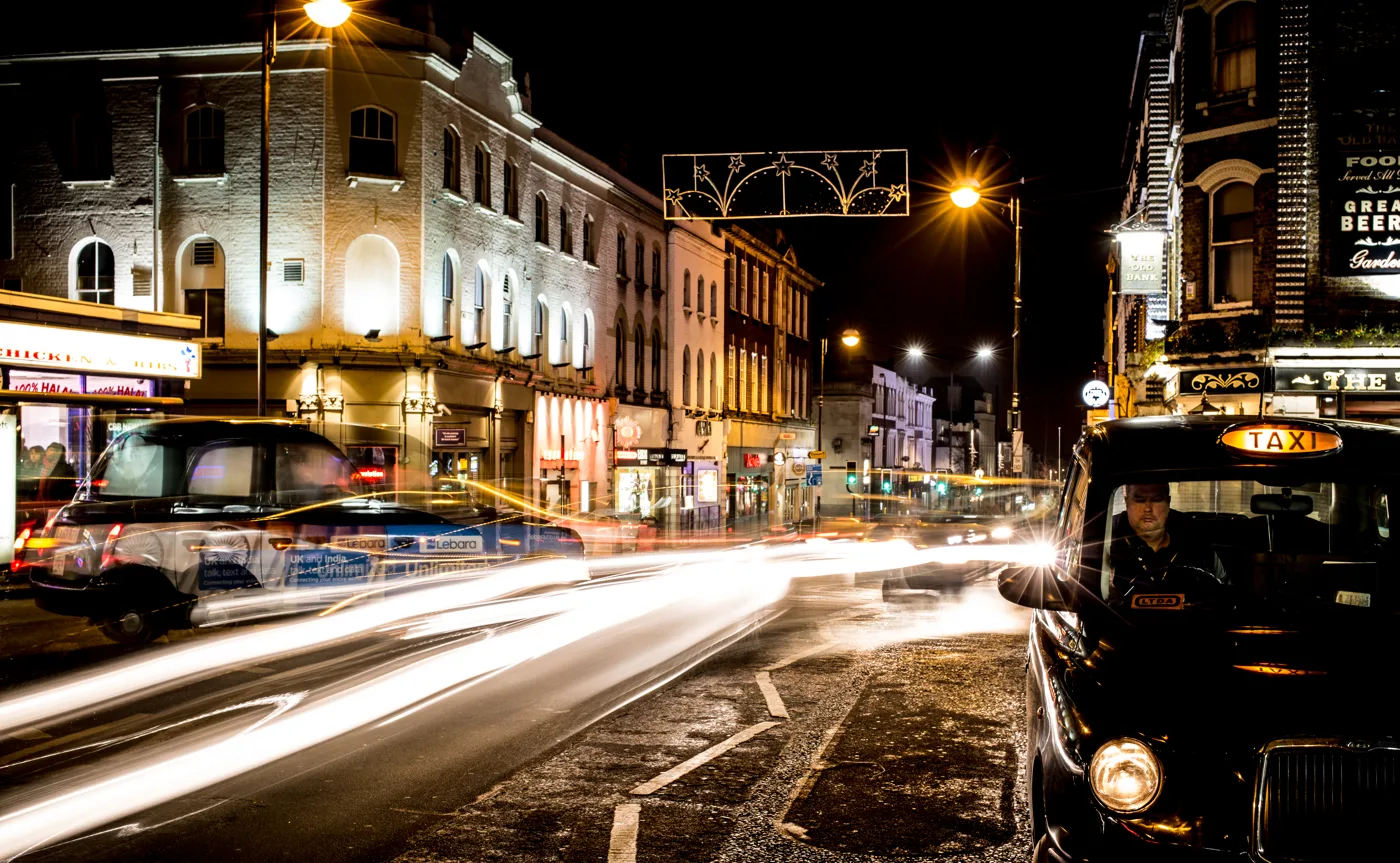 Sutton High Street at night, photographed near the railway station in January 2013. The restaurant in this story is not pictured.