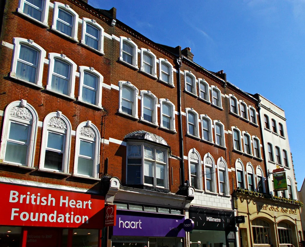 Shops on Sutton High Street. The claimant count covers the whole borough, not any one employer.